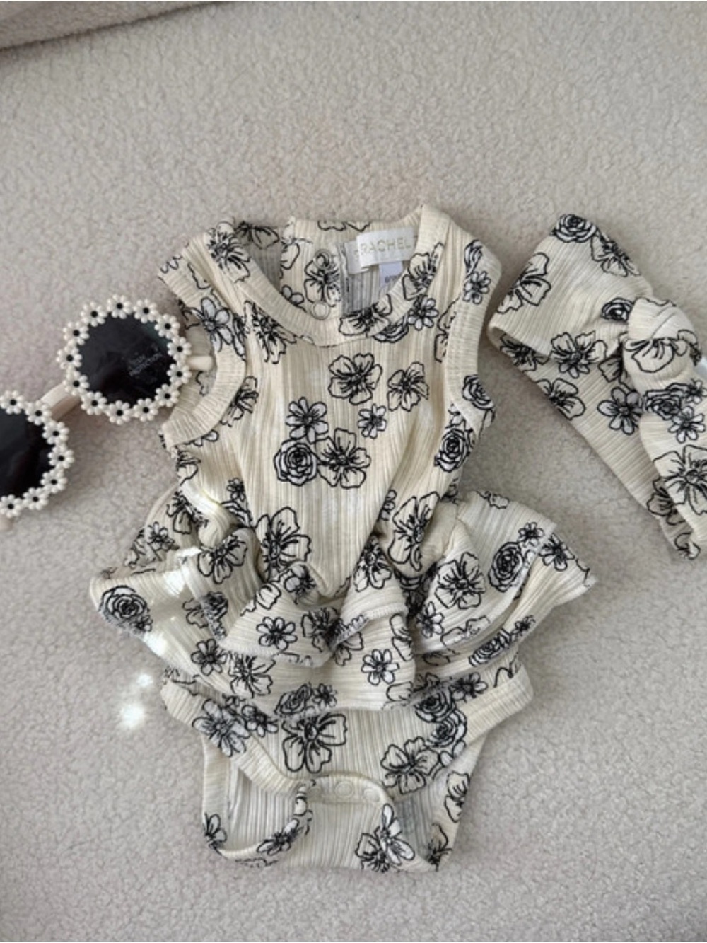 Rachel Cream and Black Floral Ruffle One-Piece